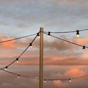 Festoon lights on stands illuminating an outdoor event in Melbourne and Bendigo.