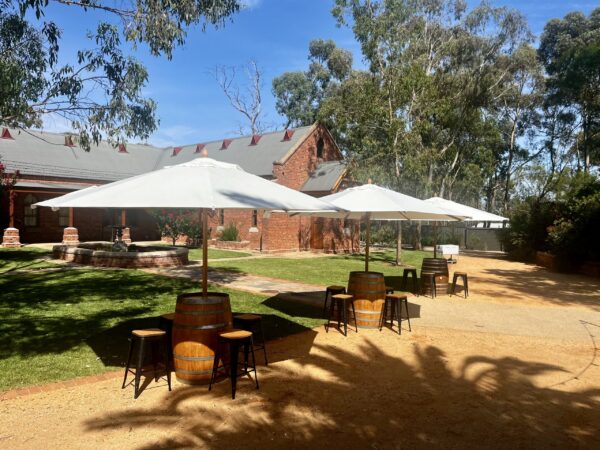 Umbrella Bundle—stylish shade, rustic charm, and comfortable seating for any Melbourne or Bendigo event.